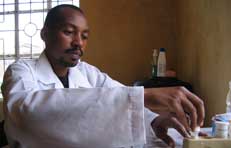 Mulwa conducting an HIV Test
