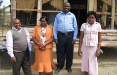 Staff standing outside the Mitaboni Primary School
