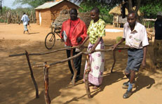 Woman using parallel bars